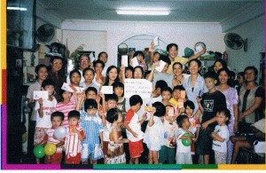 Merry Christmas! Each of the orphans got a Christmas money in an envelope. Can you find us in this photo?
