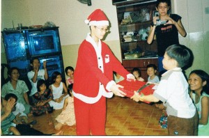 Chris, our youngest, dressed with Santa outfit. 2003