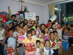 Happy kids with gifts in their hands.