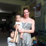 Amy with baby Thanh and Trung.